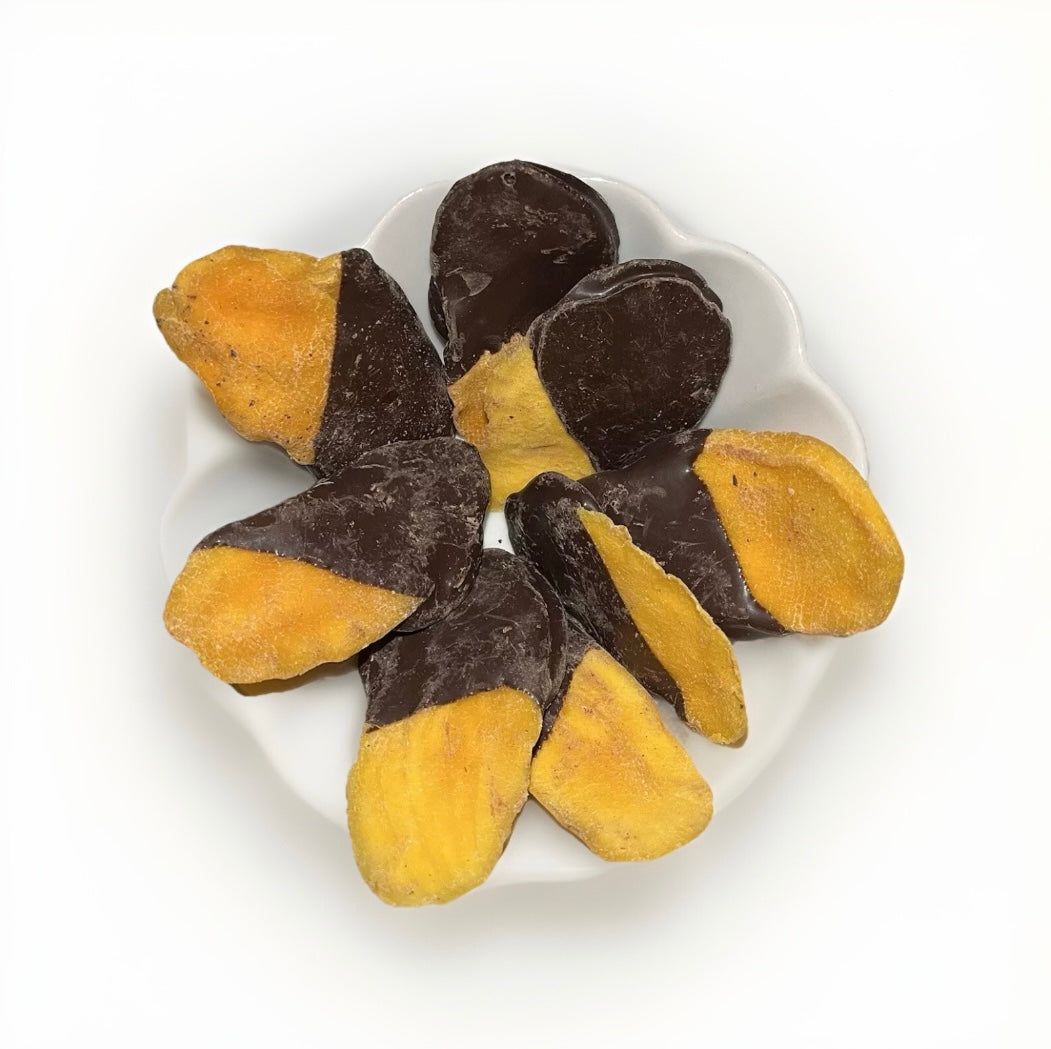 Getrocknete Mango Streifen in Zartbitter-Schokolade