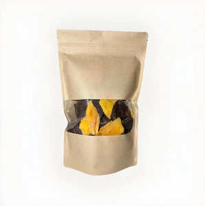 Getrocknete Mango Streifen in Zartbitter-Schokolade